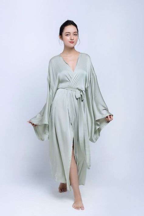 We are happy to expand your favourite silk collection. Adding silk kimonos this season. Made of blend silk. This outfit is not a substitute in the wardrobe of any woman. Included with the kimono is a belt that will emphasise the waistline, giving a refined silhouette. Robe For Women, Silk Kimono Robe, Silk Robe, Bridesmaid Robes, Womens Robes, Mint Color, Silk Kimono, Long Style, Kimono Sleeve