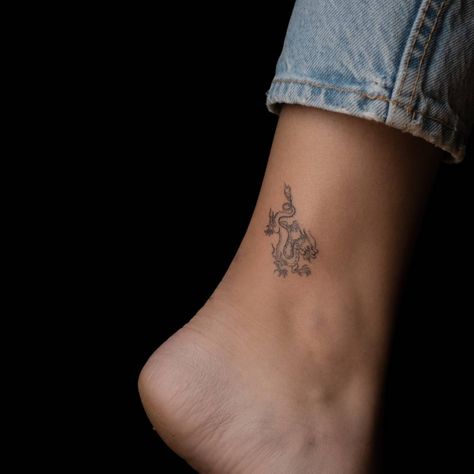 Small dragon. Small Chinese Dragon Tattoo Simple, Dragon Ankle Tattoo, Dragon Tattoo Ankle, Dragon Tattoo Simple, Cute Dragon Tattoo, Tattoo Ankle, Stick Poke Tattoo, Small Dragon Tattoos, Small Dragon