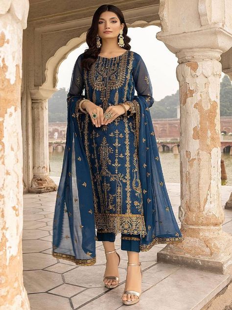 Festive Salwaar Kameez in blue colour made of semi-stitched georgette fabric. (1 Top / 1 Bottom / 1 Dupatta) Celana Fashion, Pakistani Salwar Kameez, Embroidered Pants, Heavy Embroidery, Indian Suits, Salwar Kameez Designs, Pakistani Suits, Pakistani Designers, Kurta With Pants