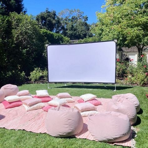 Movie night magic under the stars in Atherton! 🎬🌟 We celebrated a special birthday with a pink-themed outdoor cinema, plush pillows, and soft rugs, all under the beautiful California sky. The perfect night of laughter, films, and friends—because birthdays are better under the stars! 🌸✨🍿 #MovieNightParty #PinkVibes #UnderTheStars #BirthdayMagic #CaliforniaNights #OutdoorCinema #CelebrationUnderTheSky . . . @the.sleepover.co . . . #bayareapartydecor #partyinspiration #partyideas #childrenspart... Outdoor Movie Night Birthday Party Sweet 16, Outside Movie Night Party Seating, Pink Movie Night Party, Birthday Party Ideas Movie Night, Winter Birthday Ideas For Teens, Sleepover Themed Party, 13 Bday Party Ideas, Movie Night Themed Birthday Party, Movie Night Outside