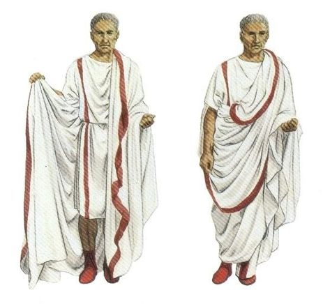 The emperial Roman toga was worn by magistrates and was a stretched rounded hexagonal figure. It was folded with a loop in the front know as the sinus. Ancient Rome Clothing, Rome Costume, Ancient Roman Clothing, Biblical Clothing, Roman Toga, Roman Senator, Roman Clothes, Roman Man, Roman Costume