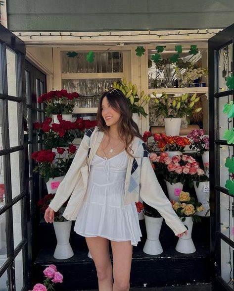 kiana 🪐 socal fashion & lifestyle on Instagram: "take your pick💐🫶🏼✨🤍 dress: @beginningboutique (use code ‘KIANAX15’) cardigan: @princesspollyboutique necklace: @enroutejewelry_ tote bag: @yesstyle shoes: @nakedwolfe - - - - - outfit details, outfit inspiration, spring style, spring aesthetic, spring fashion, white dress outfit, pinterest aesthetic, pose ideas, aesthetic feed" Whote Shoes, White Dress With Cardigan, Socal Fashion, Fashion White Dress, Aesthetic Pose Ideas, Details Outfit, Tote Bag Outfit, Socal Style, Aesthetic Pose