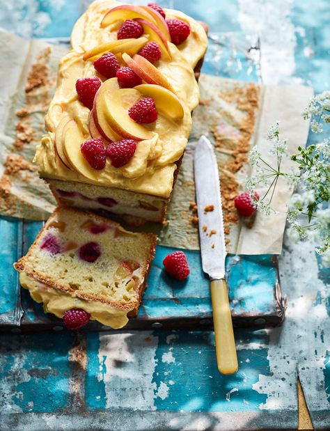 Try our summer peach melba loaf cake for a weekend baking project. It's packed with raspberries and topped with a peach butter cream Peach Melba Cake, Peach Butter, Loaf Cake Recipes, Peach Melba, Peach Cake, Pistachio Cake, Bowl Cake, Cake Recipes From Scratch, Homemade Cake Recipes