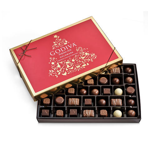 Holiday Gift Box of assorted decadent flavors, this Belgian chocolate by Godiva makes the perfect holiday gift. 36 pieces in all. Chocolate Box Aesthetic, Chocolate Dome, Dark Chocolate Coconut, Godiva Chocolatier, Luxurious Chocolate, International Gifts, Godiva Chocolate, Holiday Chocolate, Chocolate Gifts Basket