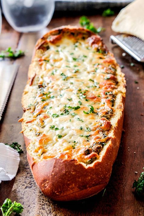 25 Crowd-Pleasing Fourth of July Recipes via @PureWow Spinach Artichoke Dip In Bread Loaf, Spinach Loaf Recipes, Easy O'dourves Appetizers, Stuffed Bread Appetizers, Fourth Of July Recipes, Spinach Dip Easy, 4th July Food, 4th Of July Recipes, Stuffed Bread