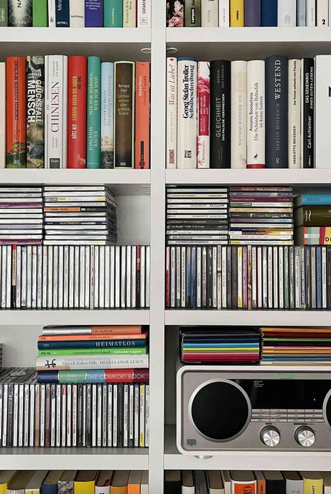 From floating shelves to built-in drawers to displaying CDs like art, here are 10 CD storage ideas to help bring style and function to your prized musical possessions. #cdstorageideas #vinylstorageideas #cleanhouse #cleaningguide #cleaninghacks #cleaningtips  #stepbystepcleaning #thespruce Cd Storage Ideas Diy, Cd Collection Display, Cd Organization Ideas, Ikea Cd Storage, Cd Display Ideas, Cds Storage, Cd Collection Aesthetic, Cd Storage Ideas, Organize Shelves