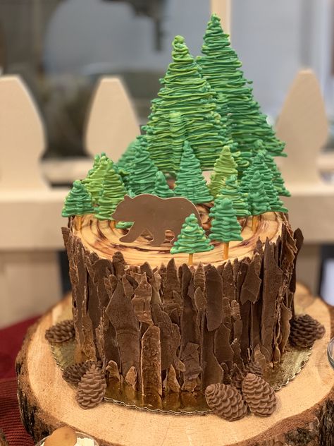 Bear inspired chocolate peanut butter pine tree round cake, adorned with chocolate bark, edible pine cones, Bear and pine trees! #pinecones #pinecake #bearcake #cake #kendrascountrybakery Frosting Trees On Cake, Edible Pine Trees For Cake, Chocolate Tree Bark, Chocolate Bark Cake, Nursing Cake, Chocolate Tree, Homemade Cupcakes, Tree Cake, Forest Cake