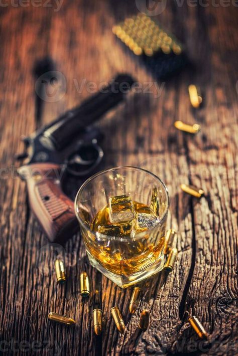 Glass of whiskey cognac or bourbon with revolver and bullets on wooden table Glass Of Whisky, Glass Of Whiskey, Table Table, Wooden Table, Wooden Tables, Bourbon, Cognac, Whiskey, Business Card