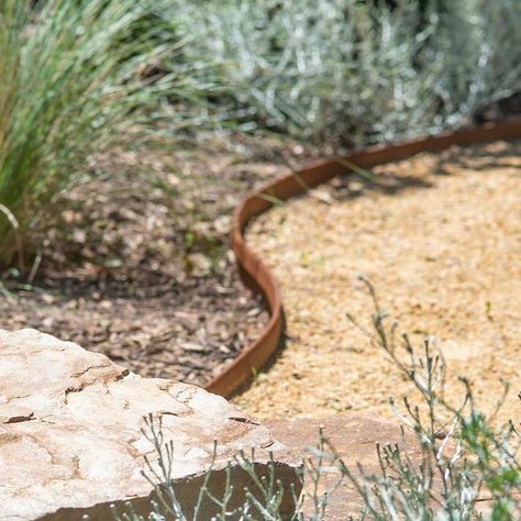 John Leathart on Instagram: "A blending of textures - a meshing of materials. Constructing this @spherelandscapedesign garden took us to our happy place using @adelaidehillssandstone stone, @eghollard Corten steel edging and recycled red bricks. @longshotimages capturing the details with her usual style!" Steel Edge Garden Bed, Garden Corten Steel, Corten Steel Edging Landscape, Steel Garden Edging Ideas, Steel Edge Landscape, Cottage Garden Edging Ideas, Corten Edging Garden, Garden Path Edging, Corten Steel Garden Edging