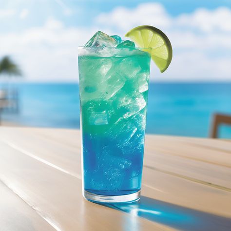 Mermaid Blue Cocktail Recipe - The Mermaid Blue cocktail offers a refreshing, citrusy taste with a sweet and slightly spicy undercurrent from the ginger beer. The vodka provides a smooth, strong backbone, while the blue curacao imparts a sweet orange flavor and the signature blue hue. Ginger Beer Cocktail, 21 Dinner, Blue Drink, Light Appetizers, Cocktail Ideas, Blue Drinks, Colorful Drinks, Colorful Cocktails, Fresh Drinks