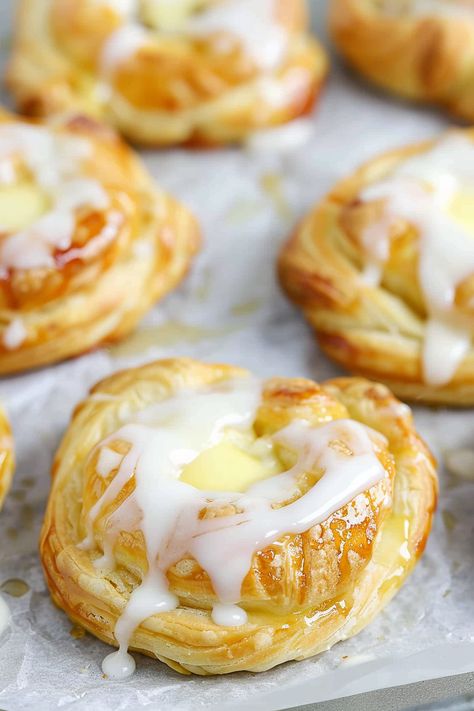 Cream Cheese Danish, flaky and buttery, are surprisingly easy to prepare with frozen puff pastry sheets! No need for professional pastry chef skills to whip up these delightful treats, ideal for breakfast, brunch, or a snack. Just seven ingredients and a bit of your time can yield bakery-quality Cheese Danish right from your own kitchen. Frozen Puff Pastry Recipes, Homemade Cheese Danish Recipe, Homemade Cheese Danish, Danish Recipe Puff Pastry, Cherry Cheese Danish Recipe, Easy Cream Cheese Danish Recipe, Recipes Using Puff Pastry, Breakfast Danish, Puff Pastry Snacks