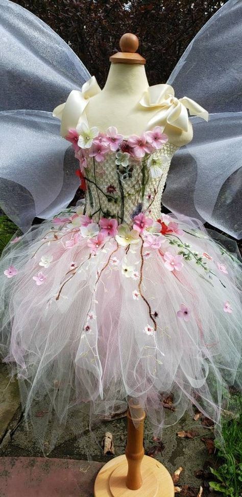 Fairy couture Tutu dress. Perfect for fairy festivals, fairy birthdays, fairy costume for any occasion. Available in ivory or red. In photos Ivory color Ivory crochet top with embroidery flowers and organza 3D satin flowers with iridescent rhinestones beautiful scissor work on the entire layers of Flower Dress Fairy, Fairy Dress Diy, Flower Fairy Dress, Fairy Costumes, Whimsical Dress, Princess Charming, Fairy Festival, Dress Fairy, Fairytale Fashion