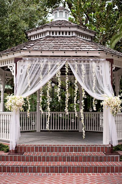 Clever Wedding Tricks | Wedding Planning, Ideas & Etiquette | Bridal Guide Magazine Gazebo Wedding Decorations, Gazebo Decorations, Gazebo Wedding, Bridal Guide, Garland Wedding, Ceremony Decorations, Wedding Backdrop, Wedding Tips, Wedding Gown