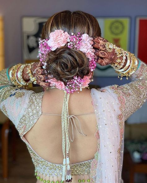 #Trending: Bridal Floral Buns With Unique Elements | WedMeGood Fancy Updo, Asian Wedding Decor, Bridal Hairstyle Indian Wedding, Medium Hair Braids, Wedding Bun, Flower Bun, Bridal Bun, Bridal Hair Buns, Wedding Hairstyles Bride