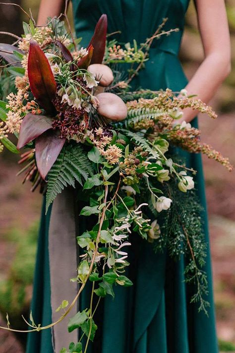 green wedding florals cascade with burgundy leaves and small flowers deers photography via instagram Trailing Greenery Bouquet, Wedding Flowers Ferns, Fairy Wedding Bouquet, Cedar Bouquet, Wedding Pallettes, Bouquet Reference, Earthy Bouquet, Green Wedding Florals, Forest Bouquet