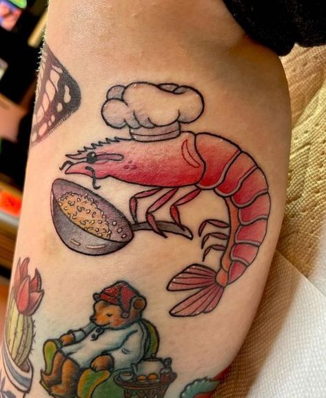 Foodie Tattoos on Instagram: "Food tattoo by @jin_ink_ #foodtattoo #foodtattoos #foodietattoo #foodietattoos #prawntattoo #shrimptattoo" Shrimp Tattoo Ideas, Traditional Shrimp Tattoo, Cute Food Tattoos, Traditional Food Tattoo, Cooking Tattoos, Food Tattoo Ideas, Foodie Tattoo, Goofy Tattoos, Shrimp Tattoo