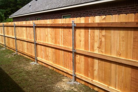 Cost of Wood Fence with Metal Posts Fence With Metal Posts, Fence Retaining Wall, T Post Fence, Vertical Fence, Redwood Fence, Steel Fence Posts, Gate Design Ideas, Metal Fence Posts, Diy Backyard Fence