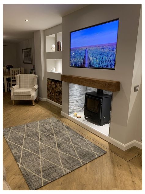 Log Store Under Tv, Storing Logs In Living Room, Bedroom Log Burner, Log Burner Under Tv, Corner Wood Stove Tv Wall, Tv Wall Log Burner, Log Burners Ideas, Lounge Room Ideas With Log Burner, Wood Burner Living Room Ideas