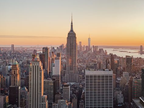 Sunset time from the Top of the Rock at Rockefeller Center is one of the must sightseeing in NYC if you are visiting the city. This photo was taken by me in 2019. You can check out more of my photos on my Instagram's profile: @teresitacc Home Nyc, Sunset Time, Nyc Life, New York Aesthetic, New York Life, Rockefeller Center, Pretty Landscapes, City Wallpaper, City Aesthetic