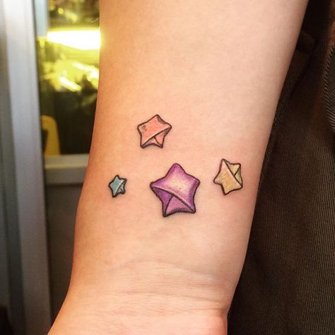 Puffy stars! ⭐️😁 #origamitattoo #puffystars #luckystars #startattoo Lucky Star Tattoo, Lucky Star Origami, Paper Crane Tattoo, 22 Tattoo, Star Origami, Origami Tattoo, Crane Tattoo, Matching Tats, Origami Lucky Star