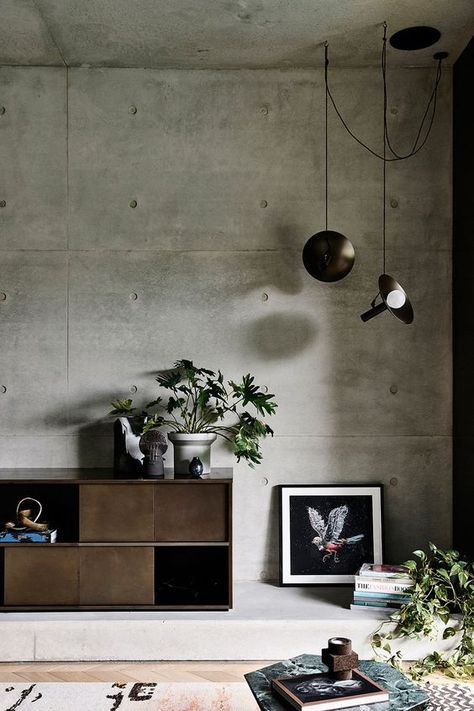 The Rising Popularity of Brutalism in Interior Design Concrete Walls Interior, Brutalism Interior, Moody Neutral, Grey Living Room Ideas, Brutalist Interior, Grey Living Room, Concrete Interiors, Industrial Livingroom, Industrial Interior Design