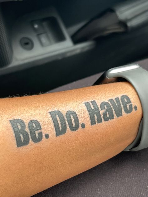 The tattoo on the black girls side forearm reads “Be. Do. Have.” In bold thick lettering. Bold Word Tattoos, Bold Tattoo Fonts, Bold Letter Tattoo, Dark Skin Tattoo, Motivational Tattoos, Letter Tattoo, Inspirational Tattoo, Bold Words, Big Letter