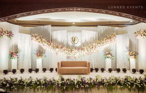 Transform your reception into a magical evening with our stunning stage decor! ✨ From elegant backdrops to intricate floral arrangements, we craft the perfect setting for your special day. 🌹 Contact us now to bring your dream reception to life! 📞 Event Planned & Decor by - @lunkedevents Bride : @ruchi_punmia Groom : @chirag_0204 Couple : @raag_se_ruh_tak Memory : @shyam [Reception Stage, Event Decor, Wedding Decor , Elegant Weddings, Chennai Events, Floral Design , Dream Wedding, Call ... Reception Stage Decoration Backdrops, Evening Wedding Decor, Dream Reception, Reception Stage, Reception Stage Decor, Reception Backdrop, Wedding Reception Backdrop, Garden Reception, Stage Decor