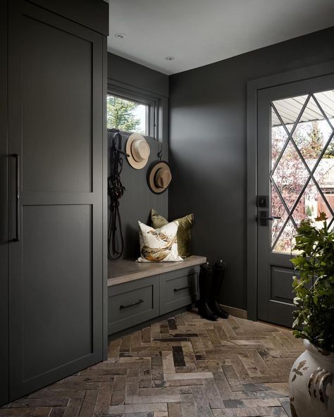 Hue Design Group auf Instagram: „The stunning ‘Moody Mudroom’ from our Millarville project! This space has dark tones, with a concrete top bench and stone placed in a…“