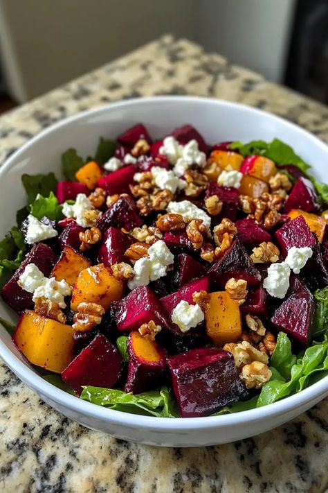 Roasted Beet Salad with Goat Cheese and Walnuts is a flavorful mix of earthy beets, creamy cheese, and crunchy nuts. Try it today! Roast Beet Salad, Roasted Beet And Goat Cheese Salad, Beat And Goat Cheese, Roasted Beet Salad With Goat Cheese, Salad Recipes Goat Cheese, Beet Salad Recipes Cold, Recipes Goat Cheese, Beet And Goat Cheese Salad, Blueberry Shortbread