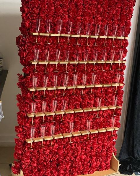 Precious Party Rentals & Decor on Instagram: "Red roses champagne wall was a guest at this 10th wedding anniversary. Thank you to our event planner Sharon for your continual support. #redchampagnewall #champagnewall #preciouspartyrentals #partyrentals #10thweddinganniversary #blacklove #westparkpartyrentals" Red Gala Decor, Ruby Jubilee, Jasmine Wedding, Champagne Wall, Rose Bar, Red Champagne, Ruby Wedding Anniversary, 21st Party, Shimmer Wall