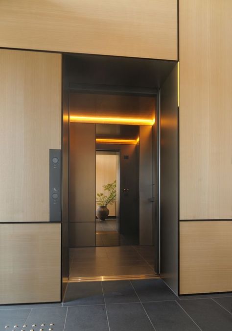 Lift Car Design, Vertical Wood Cladding, Elevator Interior Design, Elevator Lobby Design, Blue Tile Wall, Lift Lobby, Elevator Interior, Elevator Lobby, Hotel Corridor