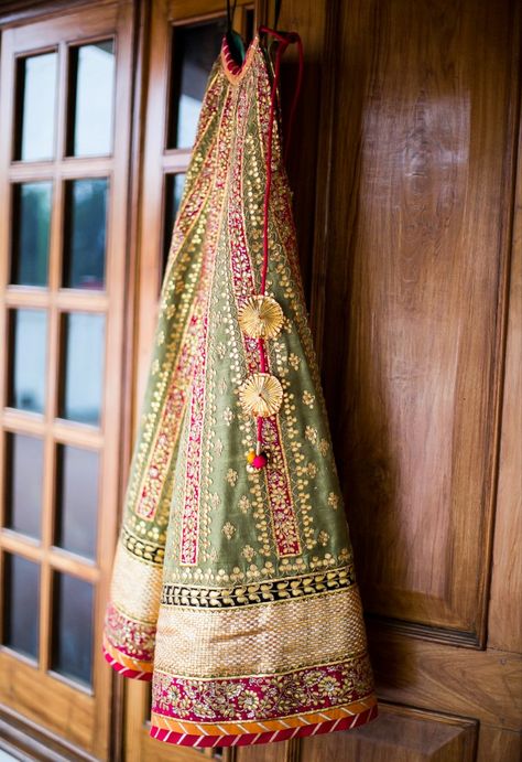 Bridal Lehengas - Olive green, gold and a flash of pink with gota patti | WedMeGood #wedmegood #bridal #Lehengas Gota Patti Lehenga, Latkan Designs, Gotta Patti, Pakistani Wedding Outfits, Indian Bridal Dress, Indian Bridal Wear, Indian Lehenga, Indian Inspired, Indian Couture