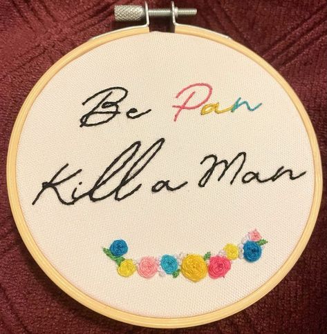 Embroidery on white fabric with wooden hoop on red background. Text "Be Pan Kill a Man" with flowers on the bottom in blue, yellow, pink, and white. Embroidery Wall Art, Pansexual Pride, Personalized Embroidery, Embroidery Hoop Art, Pride Flag, Pride Month, Hoop Art, Pride Flags, Embroidery Hoop