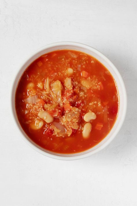 This vegan cabbage stew with bulgur and navy beans is hearty, wholesome, and comforting. It has a brothy tomato base and lots of texture from chopped cabbage, navy beans, and cracked bulgur wheat. This is a great soup to make ahead—it becomes even more flavorful after a couple days! Vegan Cabbage, Cabbage Stew, Bulgur Wheat, Navy Beans, Vegan Cheese Recipes, Vegan Dinner Recipes Easy, Cooked Cabbage, Easy Vegan Dinner, Vegan Beans