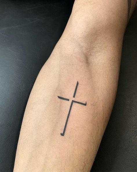 Minimalistic Hand Tattoos: Celebrating Style and Symbolism for Men 2023 - mens-club.online Tatoos Cross Men, Tatoos Men Arm Small Simple, Cross Simple Tattoo, Simple Cross Tattoo For Men, Small Cross Tattoo For Men, Woman Tattoo Aesthetic, Cross Tattoo Ideas For Men, Cross Tattoo Men, Small Arm Tattoos For Guys