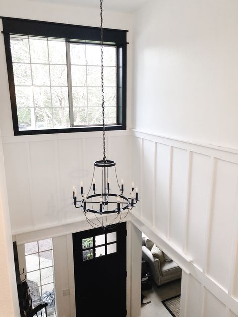 Foyer High Ceiling Entryway, Board And Batten Wall High Ceiling, Board And Batten High Ceiling, Vaulted Entryway Ideas, Tall Ceiling Entryway, High Ceiling Entryway Ideas, Stairwell Update, High Ceiling Foyer Ideas Entryway, Floating Farmhouse Shelves