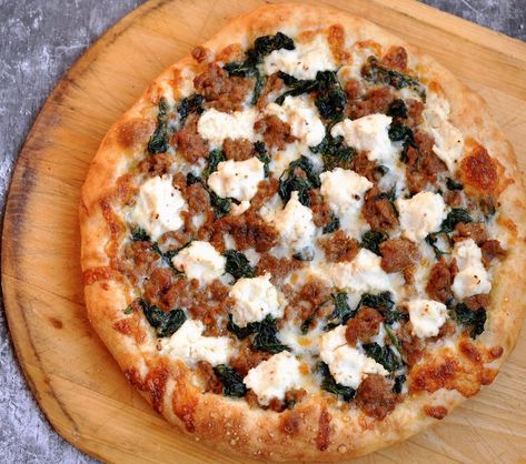 Recipe: Spicy Sausage, Spinach and Ricotta Pizza | Star Tribune Italian Sausage Pizza, Ricotta Pizza, Pizza Recipes Pepperoni, Spinach Pizza, Sausage Spinach, Spinach And Ricotta, Sausage Pizza, Spinach Ricotta, Grilled Sausage