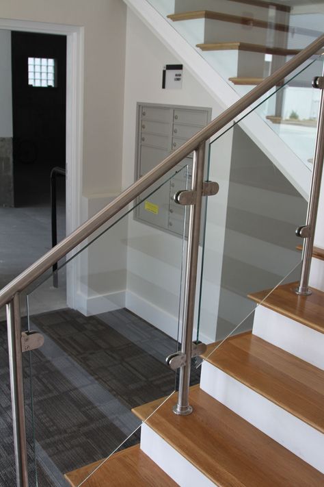 Stainless Stair Railing, Stair Railing Design Stainless Steel, Stainless Steel Handrail Design, Steel And Glass Railing Design, Stair Decorations, Stairs Tiles Design, Stainless Steel Stair Railing, Glass Staircase Railing, Glass Railing Stairs