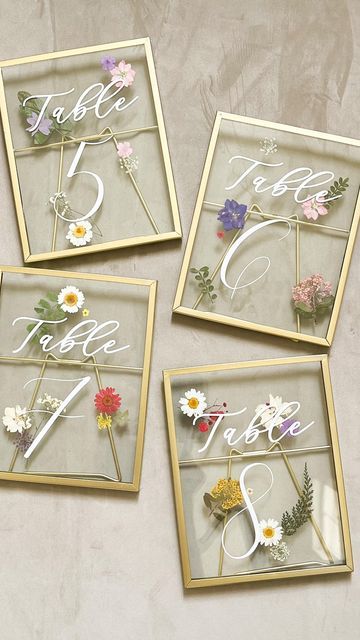 Wedding Stationery on Instagram: "1 🌼 2 🌸 3 🌻 4 🌺 tell me if you’ve ever loved a table number more 🤩 • • • #tablenumbers #pressedflowers #wildflowers #wildflowerwedding #tablescape #weddingtable #weddingtableinspo #springwedding #summerwedding #lookgoodonpaper #lookgoodonpaperco" Dried Floral Table Numbers, Pressed Flower Frame Table Number, Table Numbers Wedding Pressed Flowers, Whimsical Table Numbers Wedding, Pressed Flower Wedding Table Numbers, Pressed Floral Table Numbers, Wild Flower Table Numbers, Boho Wildflower Wedding Invitation, Wildflower Wedding Table Settings