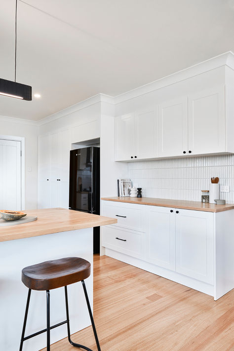 A light and bright modern kitchen! Featuring off the shelf macaroon doors and panels and solid timber American oak benchtops. White Kitchen Wood Benchtop, Wood Benchtop Kitchen, Wooden Benchtop Kitchen, Timber Benchtop Kitchen, Wood Benchtop, Wooden Benchtop, Timber Benchtop, White Cupboards, Scandi Kitchen