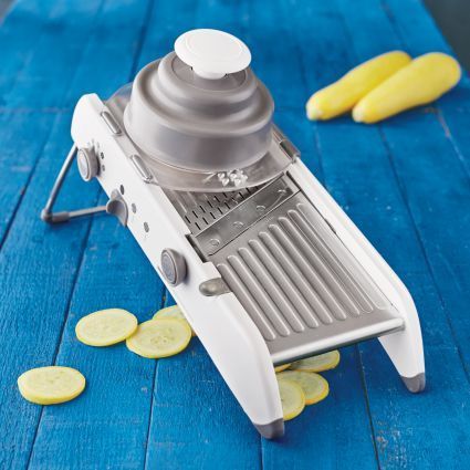 Progressive PL8 Professional Mandoline Slice, julienne, waffle-cut and more with this professional-grade mandoline. A quick, easy way to prep veggies and fruit, mandoline features four slicing thicknesses, a durable stainless steel slicing deck and a stable, nonslip base that keeps the mandoline from sliding during use.   Thanks to integrated, multi-function blades and handy controls, changing from julienning to slicing or adjusting slice thickness is as simple as turning a knob. Affiliate  Link Cucumber Tea Sandwiches, Julienned Carrots, Mandolin Slicer, Cut Resistant Gloves, Think Geek, Kitchen Must Haves, Hot Chocolate Mug, Rugs Kitchen, Tools For Sale