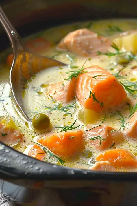 Traditional Finnish Salmon Chowder: creamy, hearty soup with salmon, potatoes, and fresh dill. Cozy comfort in every spoonful! Finland Salmon Soup, Dairy Free Salmon Chowder, Finish Salmon Soup, Creamy Salmon Soup, Salmon Potato Soup, Salmon Potato Bake, Finnish Salmon Soup Recipe, Salmon Soup Recipes, Salmon Bisque