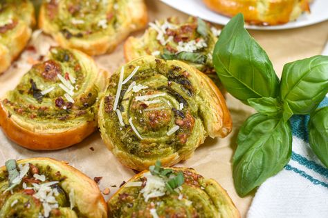 A recipe for puff pastry pinwheels with pesto, basil, and Parmesan cheese, plus a sprinkling of chili flakes. These easy cheese and pesto pinwheels require just 6 ingredients and come together in under an hour. The best puff pastry appetizer recipe! Best Pinwheel Appetizers, Recipe For Puff Pastry, Pesto Pinwheels, Recipes Using Puff Pastry, Puff Pastry Recipes Appetizers, Pastry Pinwheels, Pesto Basil, Puff Pastry Pinwheels, Puff Pastry Appetizers