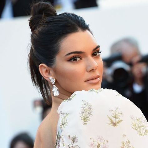 Try a top knot and middle-part combo a la Kendall Jenner for your next formal event. High Buns, French Plait, Middle Hair, Parting Hair, Trendy Bride, It's Too Hot, Workout Hairstyles, Celebrity Jewelry, High Bun