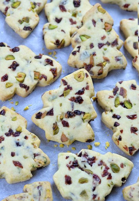 Bunch of Cranberry Pistachio Christmas Shortbread Cookies on a white paper. Pistachio Cut Out Cookies, Christmas Tree Shortbread Cookies, American Christmas Cookies, Pistachio Christmas, Christmas Shortbread Cookies, Pistachio Shortbread, Easy Shortbread, Easy Dessert Recipes Christmas, Shortbread Cookies Christmas