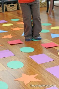 Shape hopscotch - Indoor Games for Kids: The school has vinyl shapes that could be used for this game. Maybe make dice to use with this to have students roll to know where to jump. Indoor Activities For Toddlers, Indoor Games For Kids, Shapes Preschool, Gross Motor Activities, Shapes Activities, Games Activities, Preschool Lessons, Toddler Learning Activities, Indoor Games