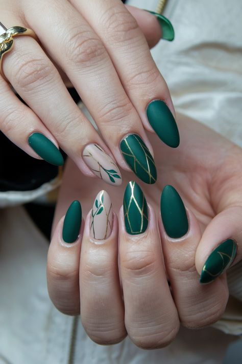 Embrace the essence of autumn with these chic forest green fall nail ideas that effortlessly capture the season's spirit. The deep, earthy tones paired with subtle gold accents create a sophisticated look, perfect for cozy gatherings and crisp days. These nails will have everyone asking for your secret! Get ready to showcase your style as you step into fall full of confidence. Forest Green And Gold Nails, Green Accent Nails, Autumn Nails Green, Forest Green Nail Ideas, Ireland Nails, Woodland Nails, Green Autumn Nails, Forest Nails, Fall Nail Ideas