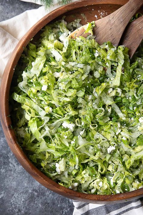 Maroulosalata is a classic Greek salad made with finely chopped romaine lettuce, dill, fresh green onions, and creamy feta cheese, all tossed in a refreshing lemony dressing! It’s a quick and simple salad to prepare, but you’ll be amazed by the burst of flavors it delivers! Romaine Feta Dill Salad, Shabbat Green Salad, Romaine Salad Ideas, Recipes With Romaine Lettuce, Maroulosalata Salad, Authentic Greek Salad, Romaine Salad Recipes, Simple Salad Recipes, Romaine Lettuce Recipe