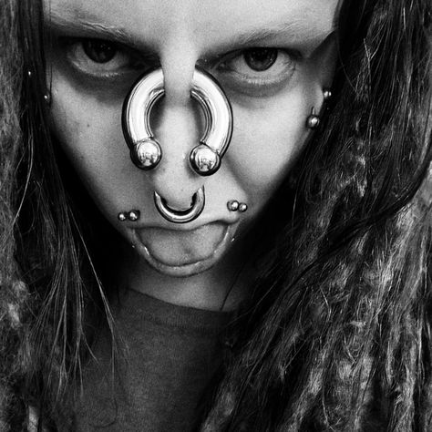 Floating Nomad, Emo Piercings, Crazy Piercings, Body Modification Piercings, Stretched Septum, Facial Pictures, Punk Fashion Diy, Bridge Piercing, Septum Piercing Jewelry