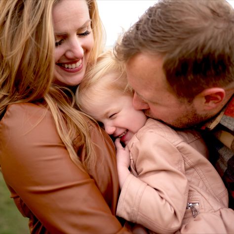 A family of three hugging outdoors in a field at North Park, PA. Pittsburgh Photography, Park Family Photos, Outdoor Family Photoshoot, First Family Photos, Lifestyle Family Photography, Winter Family Photos, Family Christmas Card Photos, 1st Birthday Pictures, Family Park